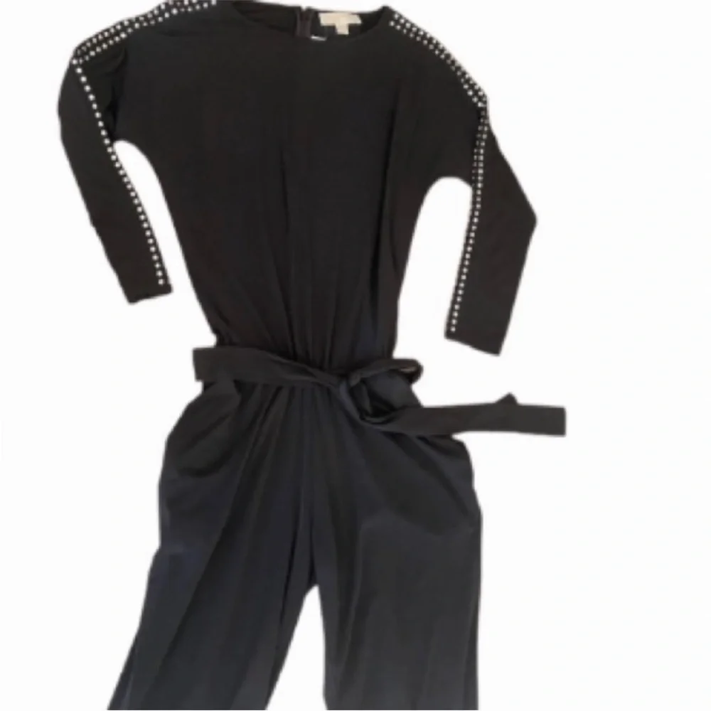 Micheal Kors size medium black long sleeve jumpsuit rhinestone embellished